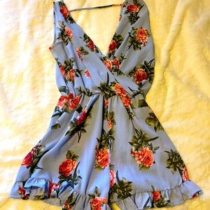 Size small baby blue with flowers romper.
